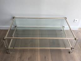 A glass coffee table makes for an elegant, subtle addition to the room, while a coffee table with storage is perfect for creating space for a striking centerpiece. Large Lucite And Chrome Coffee Table 1970s For Sale At Pamono