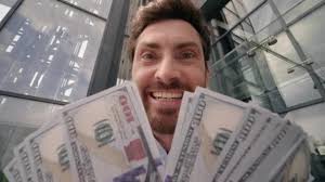 Happy smiling excited winner rich Caucasian middle-aged businessman adult  business man employer male guy investor holding money dollars salary  currency financial profit wealth in city finance success