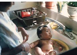 Unless your baby's skin is sweaty, oily, or dirty, plain water is enough; Memories Pictures Hold Bath Opal Palmer Adisa