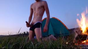 Guy drains weekly cum near campfire and tent 