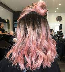 Brown To Rose Gold Pink Hair In A Bun Medium Length Wavy Hairstyle Blonde Ombre Hair Ombre Hair Blonde Spring Hair Color Pastel Pink Hair