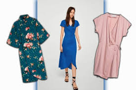 La parte anteriore presenta delle pieghe decorative e l'orlo asimmetrico; Wrap Dress L Abito A Portafoglio E Il Must Have Dell Estate 2018