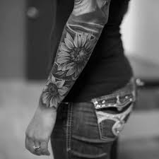 When tattoos were seen more as a symbol of rebellion than a this is a really cool black and white sleeve tattoo. 17 Awesome Full Sleeve Tattoo Designs For Females Sheideas