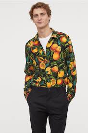 Nicolas ripoll wears a relaxed fit leopard print resort shirt $12.99 by h&m. Slim Fit Viscose Shirt Black Oranges Men H M Us Mens Shirt Dress Black Shirt Shirts