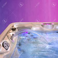 Make sure your jacuzzi or hot tub is turned off and remove the filter, rinsing it to remove large dirt particles and debris. Jacuzzi Bathtub Filling Up With Clean Water From A Three Faucet Stock Photo Picture And Royalty Free Image Image 34064717