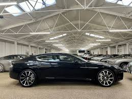 Image result for Onyx Black 2011 Aston Martin