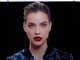 Middle notes are may rose and freesia; Armani Song Commercial Song