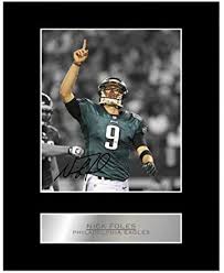 Nick foles' restructured contract this offseason pays him $500k for playing 33 percent of snaps in a playoff game — and another $500k for a win in that instance. Amazon Com Iconic Pic Nick Foles Print Signed Mounted Photo Display 1 Autographed Picture Print Posters Prints