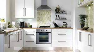 The doors attach to the frames with screws. White Kitchen Cabinets With Slab Doors Instaimage