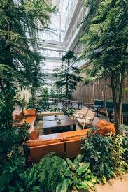 Treehouse Is A Sloping Block Of Co Living Apartments With A Tree Filled Atrium Atrium Design Architecture Atrium