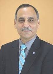 How did Iraqi professor get senior U.B. role?'