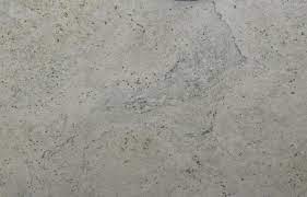 Granite's distinctive granular appearance and movement are made up of quartz, feldspar, biotite and other minerals that make it resistant to abrasion and chemicals. Cotton White Granite Countertop Stonemark Granite Countertops Daltile Granite