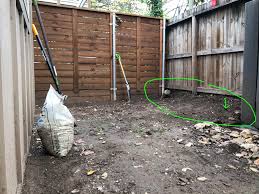 Stack the planters to take advantage of vertical space. Can I Build A Retaining Wall Using Cinder Blocks Along This Fence To Fix The 1 Foot Sloping Ground Between Our Lots Landscaping