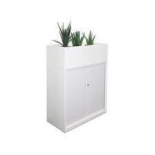 This filing cabinet planter project from baldmanmodpad is a convenient way to use old filing cabinets. Planter Tops Workstations