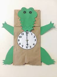 12 Months Of Literary Activities Peter Pan Peter Pan Crafts Paper Bag Crafts Clock Craft