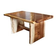 The coffee table is handmade of solid reclaimed wood which is solid, durable, and beautiful and has the characteristics of different woods like sheesham, teak, palisander, mango wood, acacia, recycled wood, hardwood, etc. Lonegan Suar Solid Wood Trestle Dining Table In 2021 Slab Dining Tables Dining Table Trestle Dining Tables
