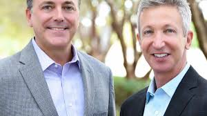 Brokers Peter Barkin and Mark Gilman of the Barkin-Gilman Group join  Compass Florida