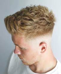 The mid fade (aka the medium fade) is just that: Medium 0 Fade Haircut