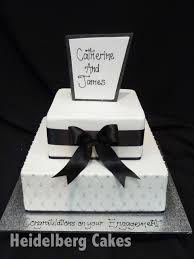 The top tier is a 6 inch chocolate cake with chocolate ganache and the second layer is a 9 inch chocolate cake with caramel filling and orange italian. Engagement 43 2 Tier Quilted Heidelberg Cakes