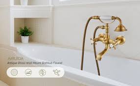 We have a large selection of vintage and modern faucets for your to choose from. Airuida Antique Brass Wall Mount Bathtub Faucet With Handheld Shower Sprayer Double Cross Handles Hot And Cold Water Mixer Tap Shower Vintage Style Amazon Com