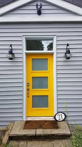 Rotating 2 1⁄2 degrees each as they ascend, the slats become a privacy screen as one moves up the stairs. The House With The Bright Yellow Door Modern Exterior By Weaver Exterior Remodeling Houzz