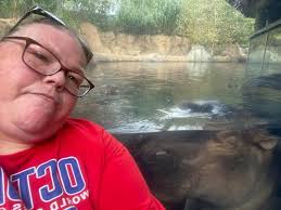 So Tucker was posing for a photo when who pushed right by him