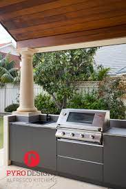 alfresco kitchen with compact laminate from laminex neolith bench tops and stainless steel negative deta build outdoor gallery cost of island sink dishwasher