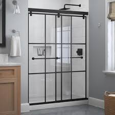 These shower doors are the perfect choice to get the spacious bathroom by removing the bathtub. The Home Depot Sells Black Matte Gridded Glass Shower Doors