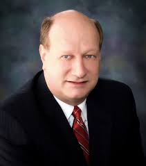 Time commitment an issue in county commissioner race