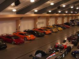 Our customizeable car condos are built to your specifications. C Est Mon Garage Luxury Car Garage Luxury Garage Luxury Cars