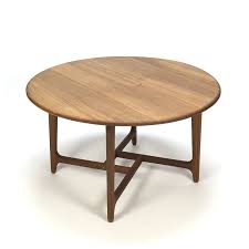 Though the shape is simple, the complexity of the. Round Danish Vintage Coffee Table With Special Teak Frame