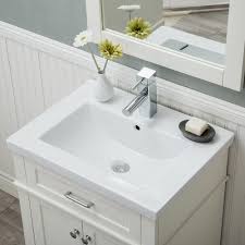 Bath sinks come in various shapes, sizes and styles. Lancaster 24 In W X 18 25 In D X 34 75 In H Vanity In White With Porcelain Top In White With White Basin He 104sl 24 W Ctsf The Home Depot Home Depot Bathroom Vanity