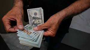Iranian rial in freefall as dollar breaks 2.1 million mark