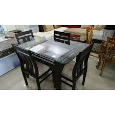 The abingdon glass 4 seater stowaway dining set is a distinctly stylish set and is extraordinarily practical for a smaller home or apartment making it the perfect addition to your dining or living space. Dining Table Set 4 Seater