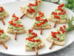 A blend of smoked salmon and sour cream gets a luxurious texture from unflavored gelatin in this simple, elegant appetizer. Christmas Themed Appetizers Healthy Christmas Treats Christmas Food Holiday Snacks