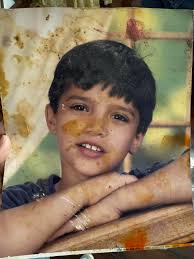 I asked last week of someone could fix this only photo of me and my nan  without any luck so please can someone remover the tape marks and stains  thanks