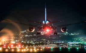 عروض الخطوط السعودية من رحلات Photo Airplane Landing Night Time
