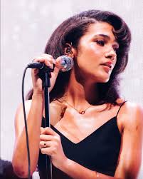 It's so easy to fall in love with Olivia Dean's whole vibe.✨ Into her  effortless hair? Celebrity hairstylist @rachelpolycarpe breaks down her  recent @acltv look, including the exact @marcanthonyhaircare, products she  used