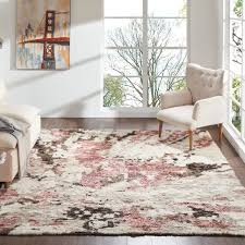 Our products range from living room rugs, to hallway runners and washable mats in a variety of colours and sizes. Abstract Shag Pink White Area Rug