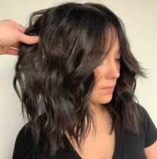 Short hair styles with a choppy or uneven fringe are also a great way to draw attention away from a round face. 50 Best Styles For Medium Length Hair With Bangs Hair Adviser