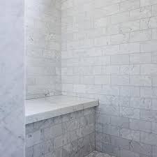 Marble bathrooms marble continues to be one of the biggest bathroom trends this year. Marble Slab Shower Bench Design Ideas