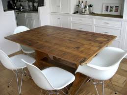This stylish wooden dining table with rustic charm will make a distinctive addition to your kitchen or dining room. Great Use Of Rustic Modern Rustic Farm Table From 150yr Old Barn Boards In Modern Nyc Loft E Rustic Trestle Dining Table Family Dining Table Dining Table