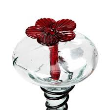 It doesn't matter what the basket is made from, but it should be at least 8 inches deep and 12 inches in diameter so that you can plant the most flowers. Hanging Basket Hummingbird Feeder Uncommon Goods