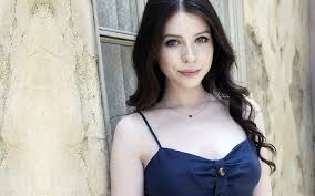Streaks of color in the hair are ok; Wallpaper Face White Women Outdoors Window Long Hair Blue Eyes Blue Dress Brunette Wall Smiling Black Hair Fashion Person Skin Michelle Trachtenberg Girl Beauty Eye Woman Lady Leg Photograph Image Hairstyle