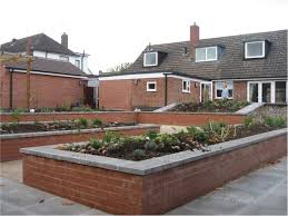 Professionally Designed Prior To Training In Garden Design Claire Morris Practiced For 12 Years As An Occu Sensory Garden School Garden Brick Raised Beds