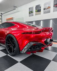 Image result for Amethyst Red 2011 Aston Martin