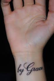 By Grace Tattoo On Wrist Tattoos For Girls Tattoo Tattoos Bodyart Wrist Tattoos Girls Grace Tattoos Tattoos