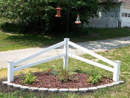 Rails placed narrow side up sag the least and are recommended for heavy fences and those with posts that are 6 feet or more apart. Flowers And Split Rail Fence Google Search Corner Landscaping Fence Landscaping Garden Yard Ideas