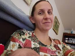 Nursing in a beautiful dress