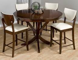 One side of the table has three storage compartments with adjustable shelving. Round Counter Height Table With Leaf Ideas On Foter